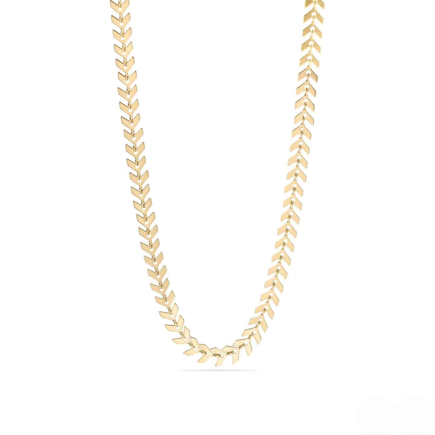 Elegant gold chevron herringbone chain necklace shown in a flat lay on a white background, showcasing its sleek, reflective design and luxurious shine—perfect for layering or wearing solo.