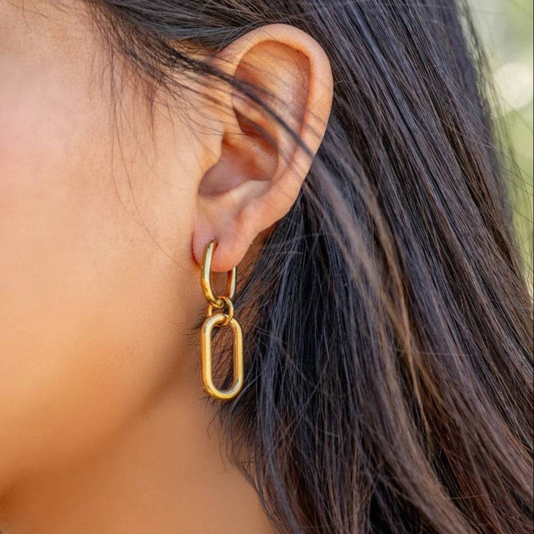 Woman wearing gold convertible huggie dangle earring – waterproof, tarnish-free, hypoallergenic jewelry by Lauren Riley Jewelry