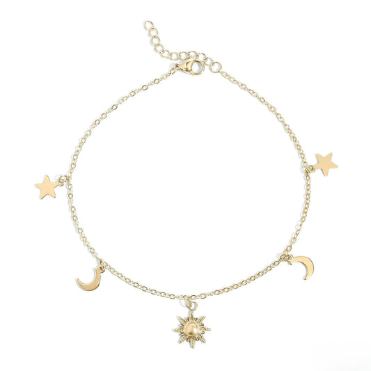 Gold celestial anklet with sun, moon, and star charms – adjustable boho-style ankle bracelet for women, perfect for summer and festival outfits