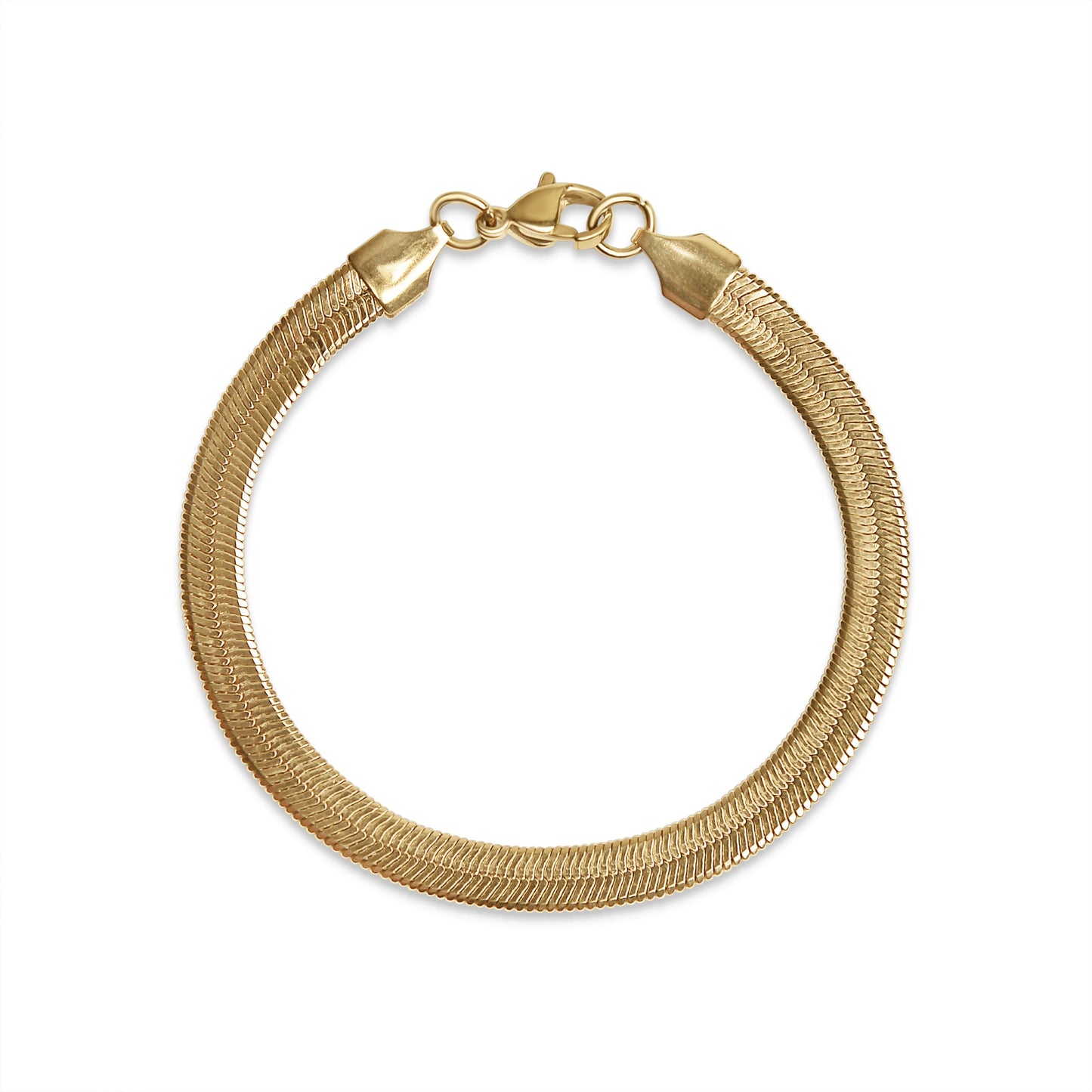 Flat lay of 18k gold PVD herringbone bracelet – hypoallergenic, tarnish-resistant piece from Lauren Riley Jewelry.