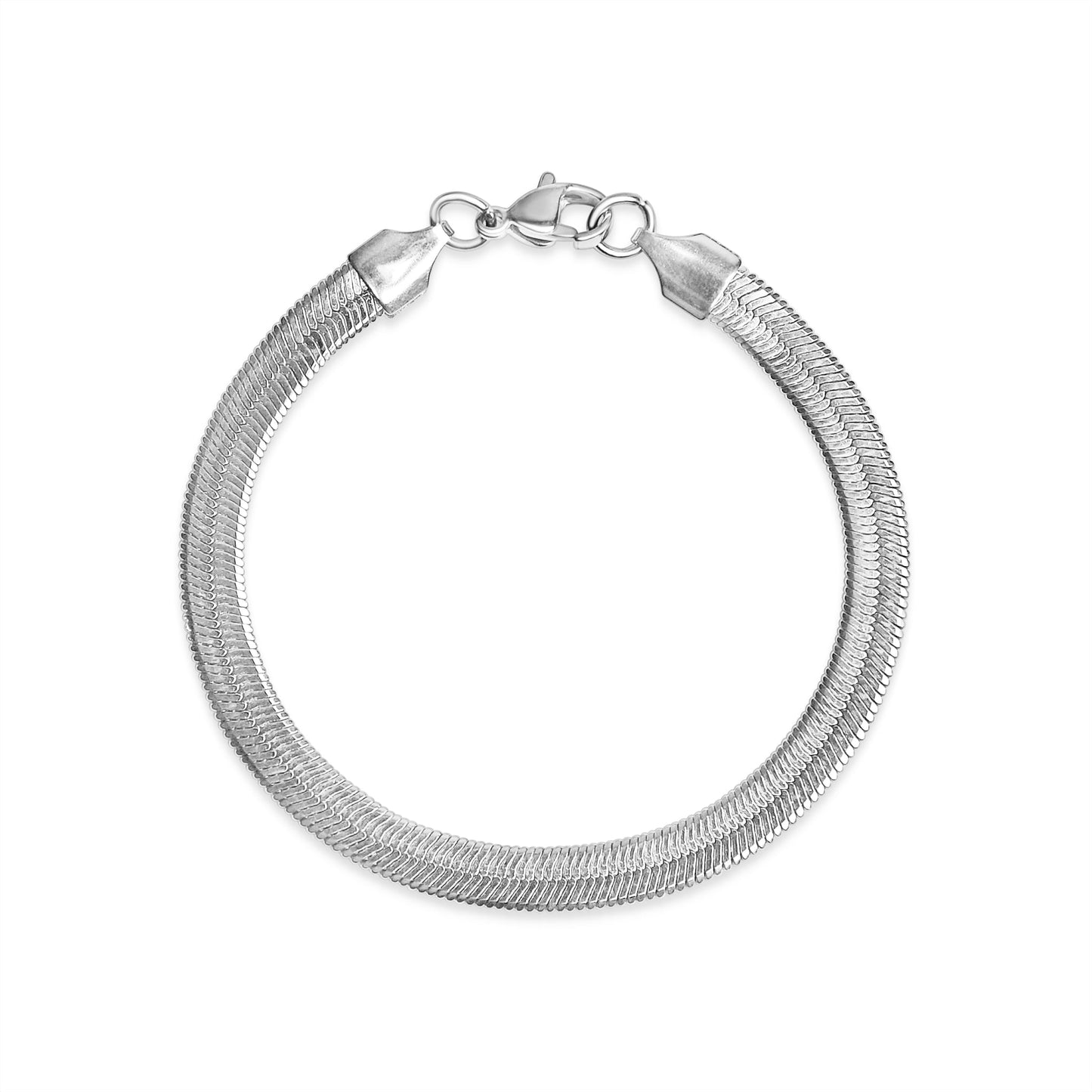 Flat lay of silver stainless steel herringbone bracelet – waterproof, hypoallergenic bracelet by Lauren Riley Jewelry.