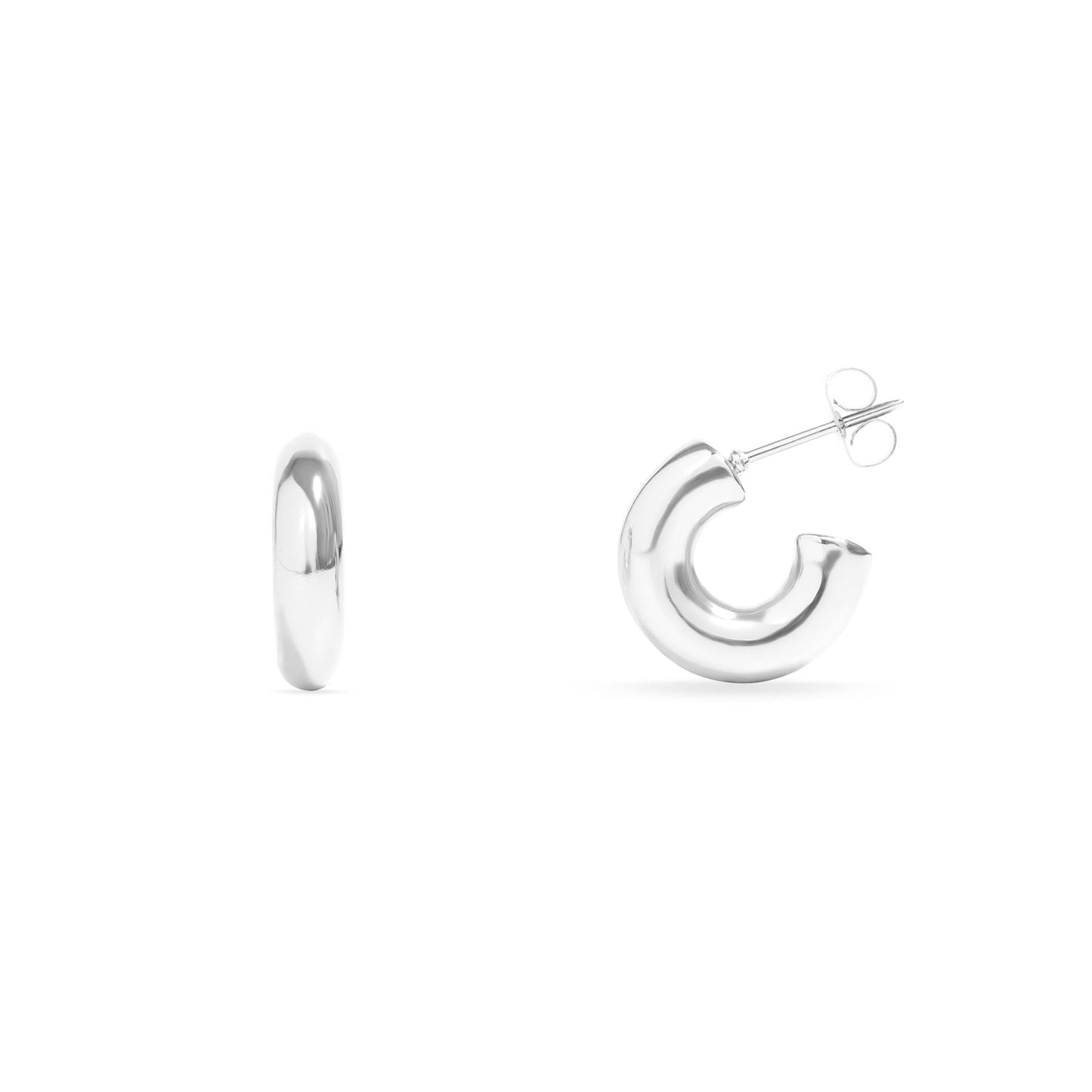 Chunky silver hoop earrings made from hypoallergenic, water-resistant stainless steel – modern statement jewelry for everyday wear