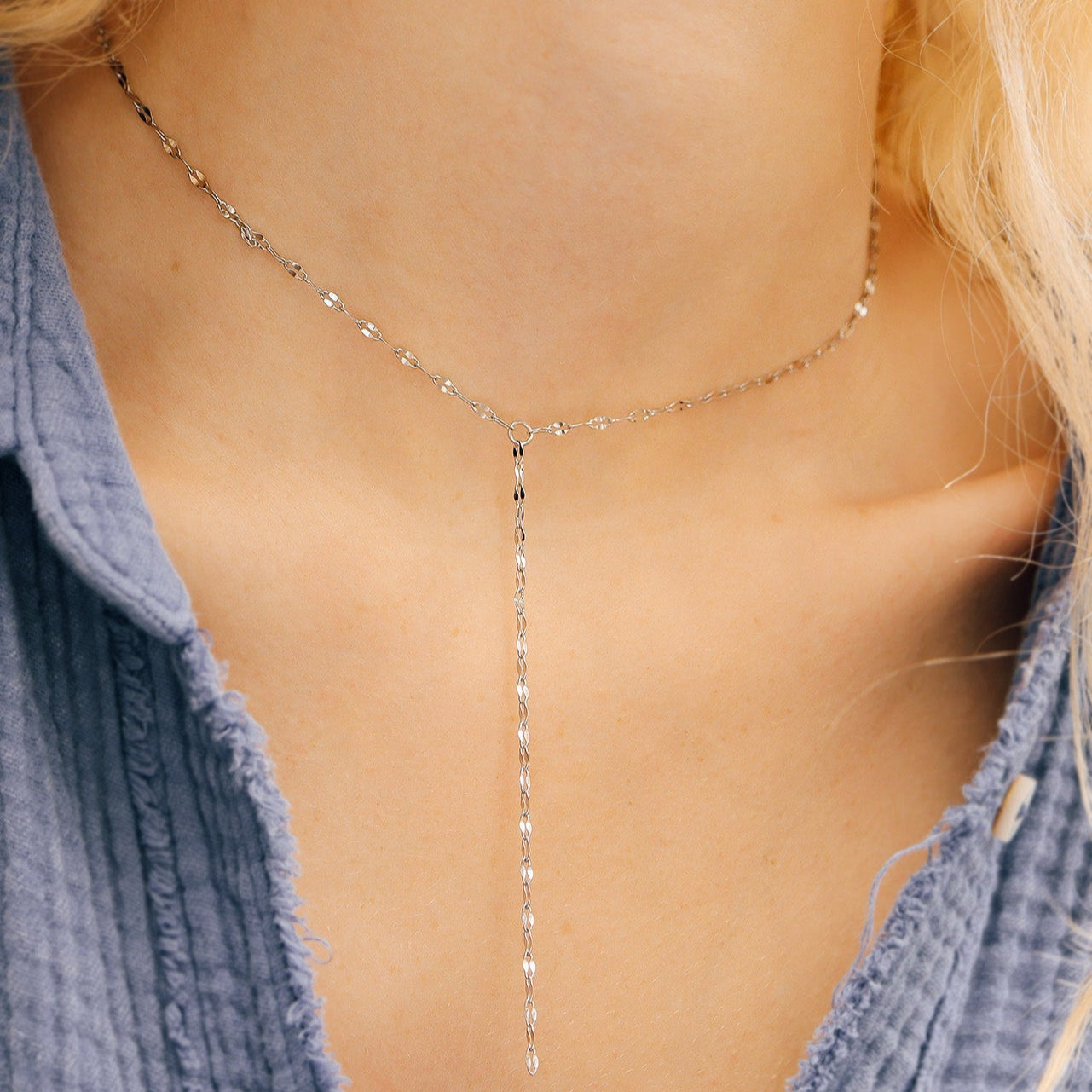 Dainty silver Y-lariat necklace on model – minimalist waterproof and tarnish-resistant stainless steel chain, perfect for layering or everyday wear.