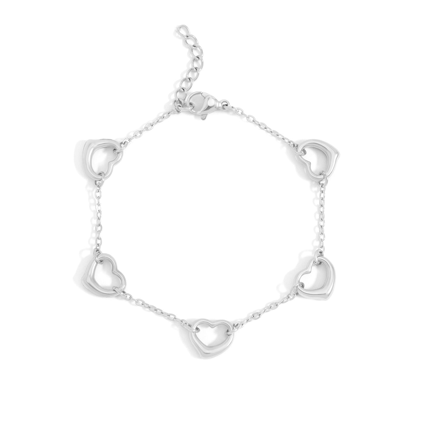 Silver heart charm bracelet with delicate open heart links, waterproof and nickel-free, ideal for stacking and everyday wear.
