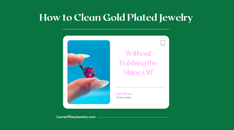 Hand holding a pink Austrian crystal earring with antique bronze finish against a vibrant blue background — blog cover for how to clean gold plated jewelry safely without damaging the shine, from Lauren Riley Jewelry.