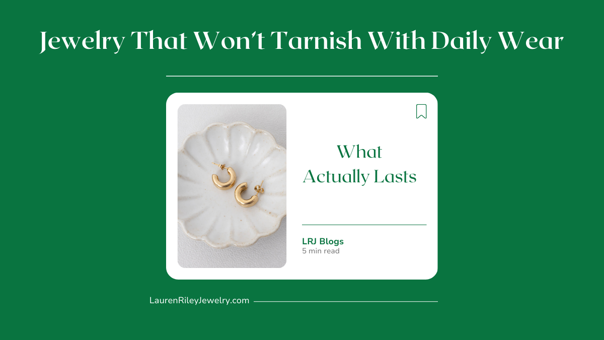 Minimal gold hoop earrings displayed on a white dish, representing jewelry that won’t tarnish with daily wear and is designed to last over time.