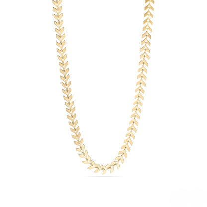 Elegant gold chevron herringbone chain necklace shown in a flat lay on a white background, showcasing its sleek, reflective design and luxurious shine—perfect for layering or wearing solo.