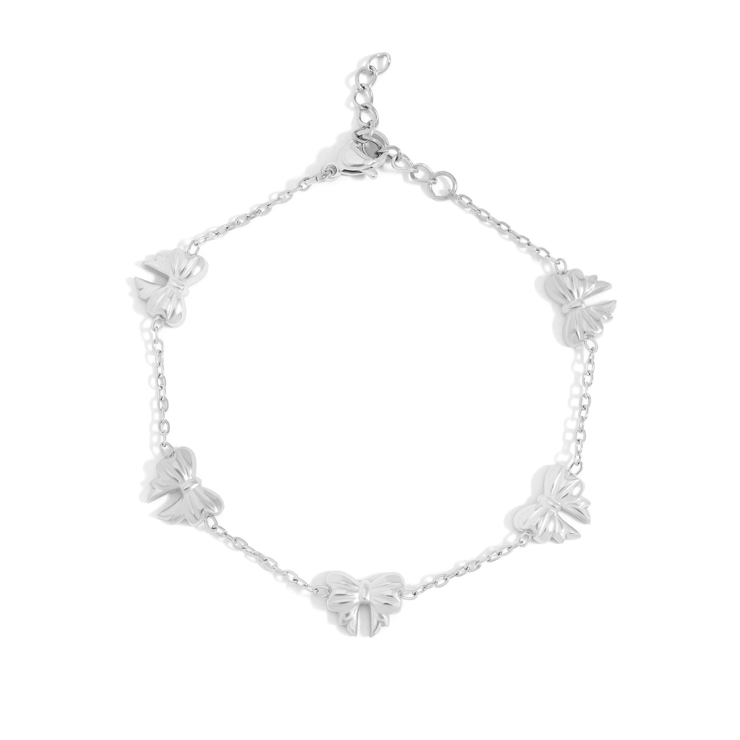 Silver bow charm bracelet made of stainless steel with hypoallergenic, water-resistant design — perfect for stacking and everyday elegance.