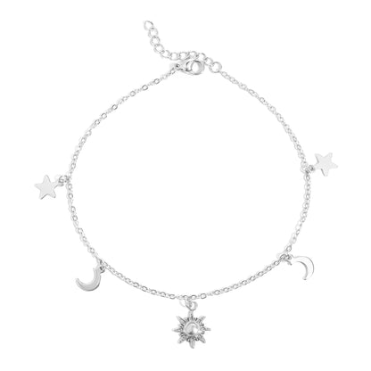 Silver celestial anklet featuring sun, moon, and star charms – dainty and adjustable ankle bracelet for women, perfect for beachwear and everyday outfits